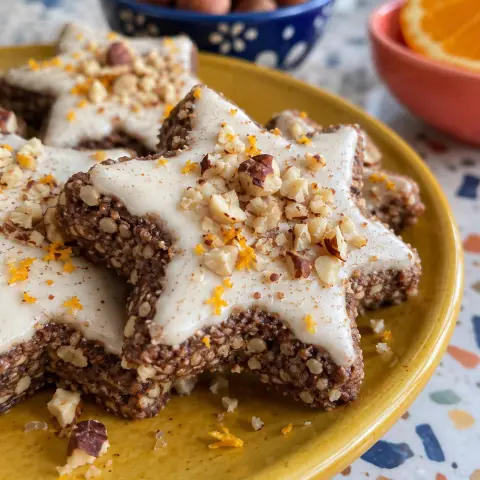 KI-generiertes Symbolbild: Rezept für Kakao-Zimtsterne mit Orange und Haselnüssen