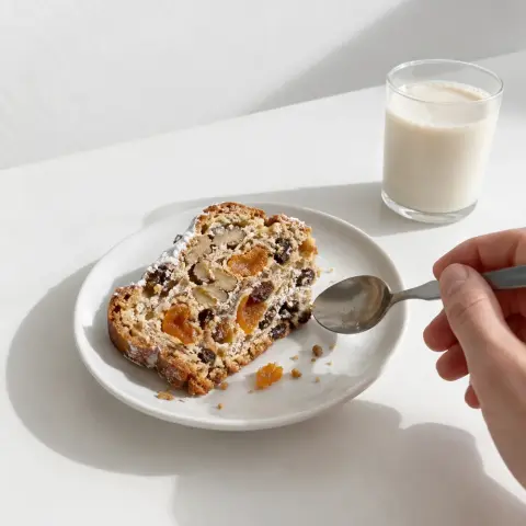 KI-generiertes Symbolbild: Rezept für Veganer Stollen mit Aprikosen, Walnüssen und Dinkel
