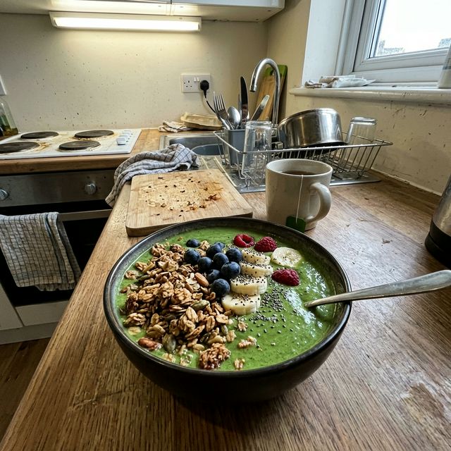 Green smoothie bowl with granola