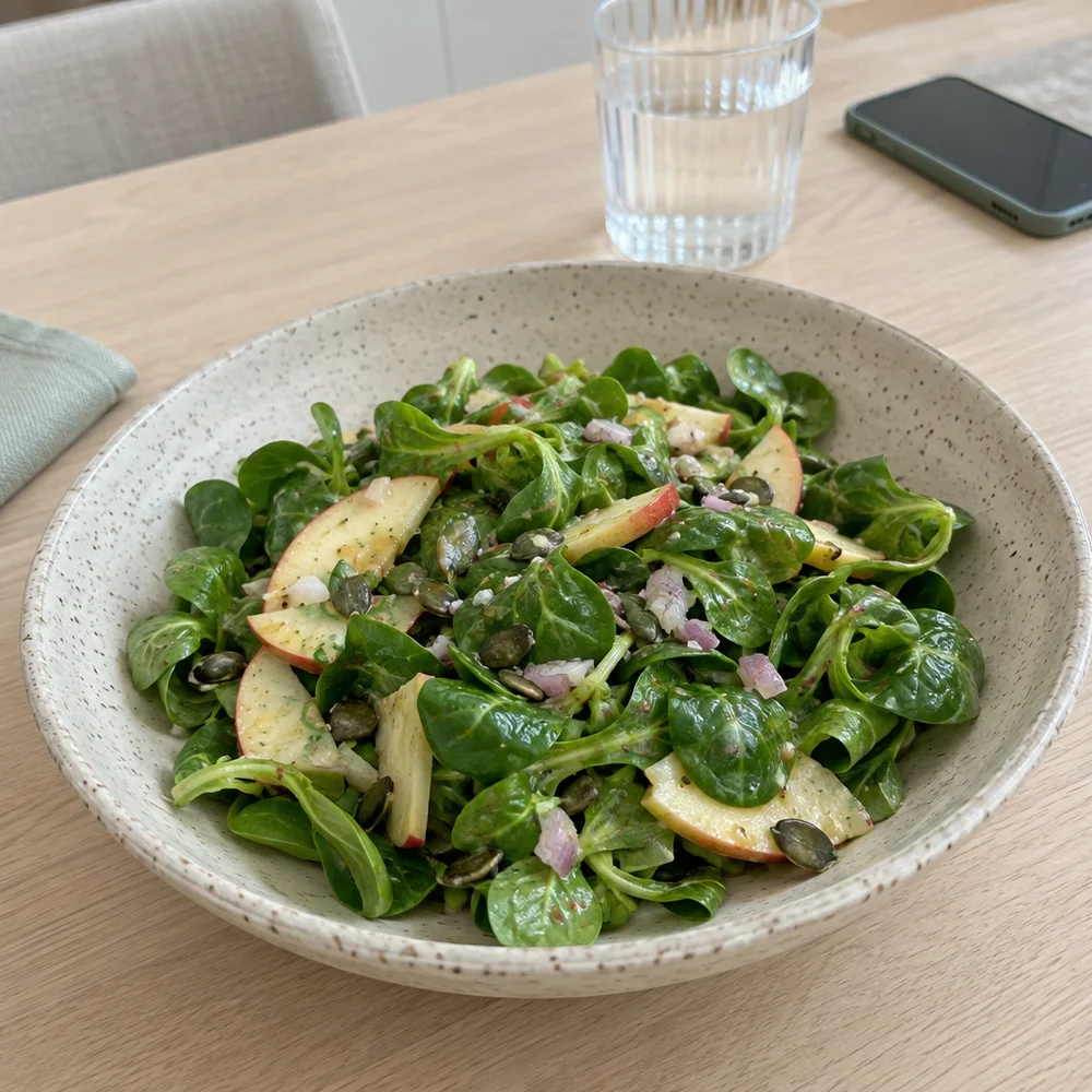 Lamb's lettuce with apple and mustard dressing for raclette and fondue