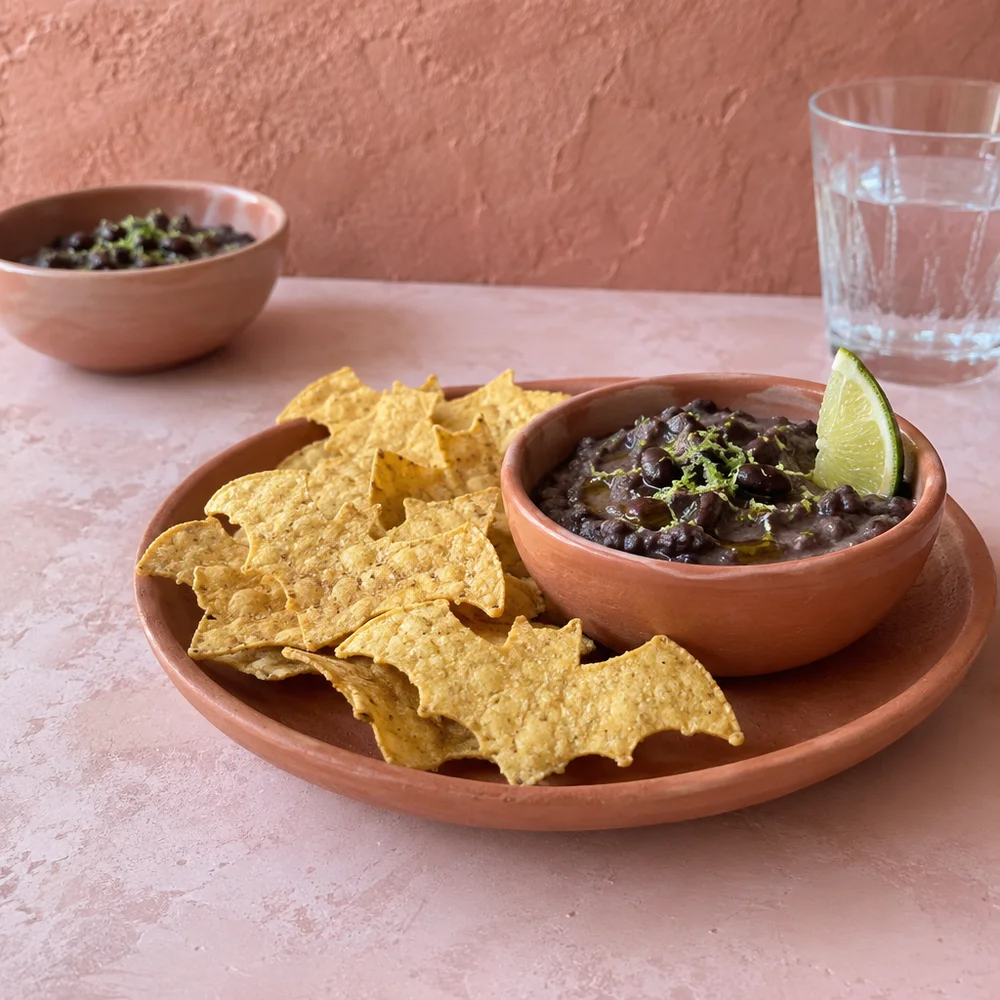 Bat crisps from corn tortillas with black bean dip