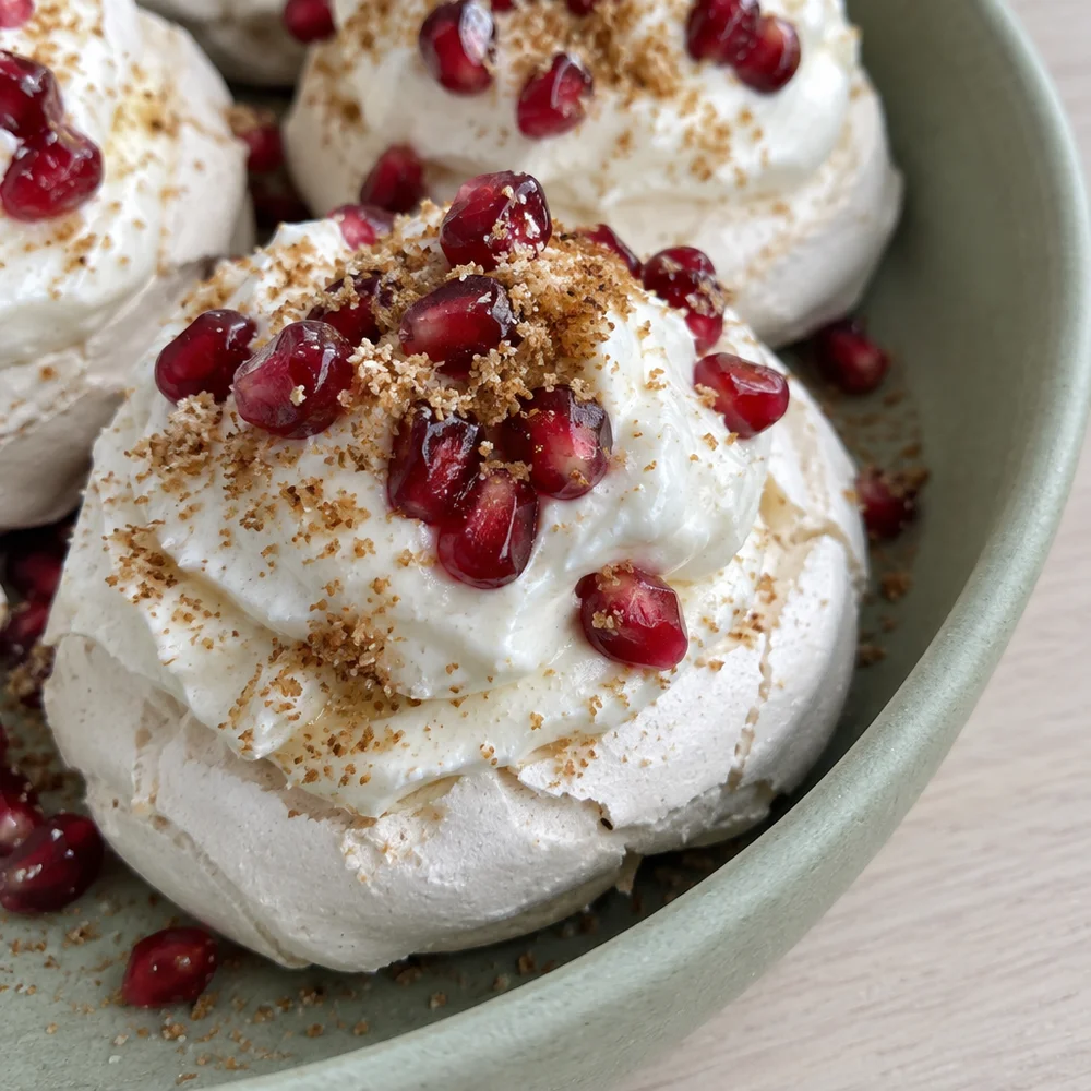 Mini pavlovas with skyr cream and pomegranate