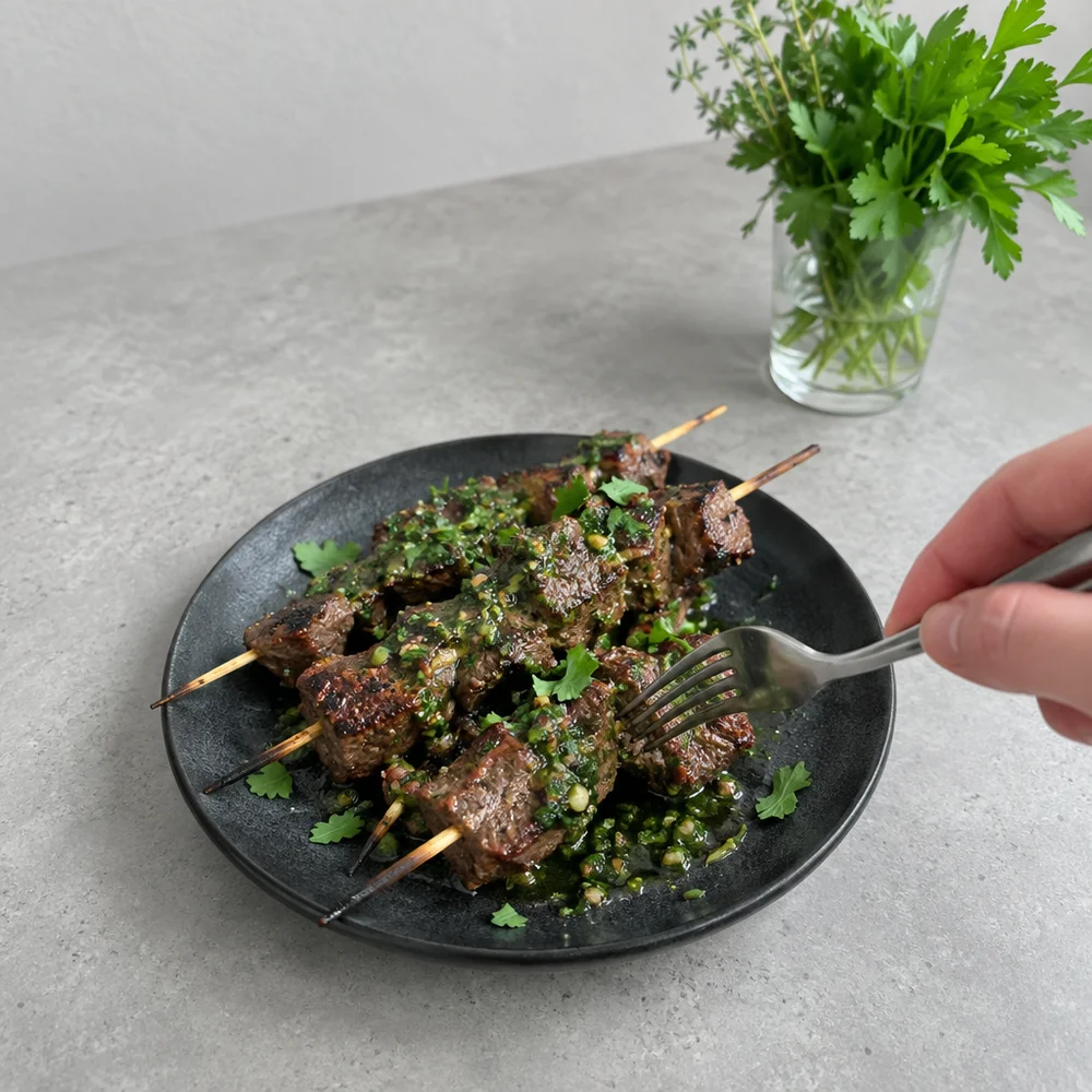 Paleo tapas skewers with rump steak and chimichurri