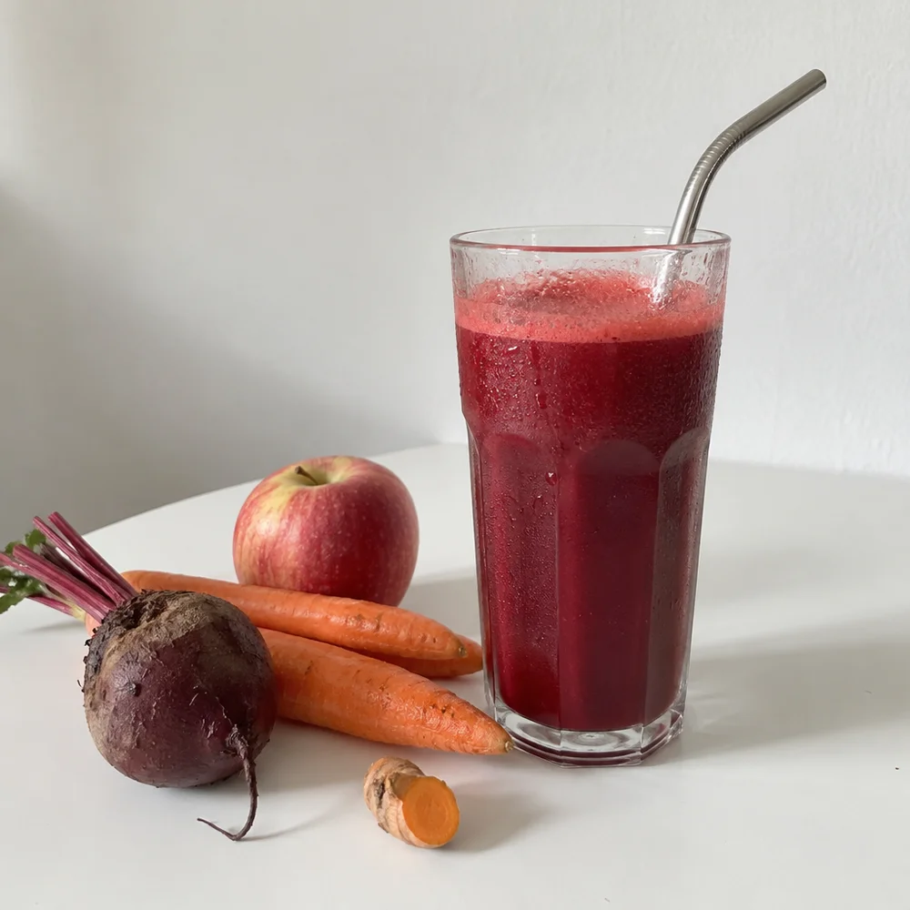 Vegan beetroot and carrot juice with turmeric