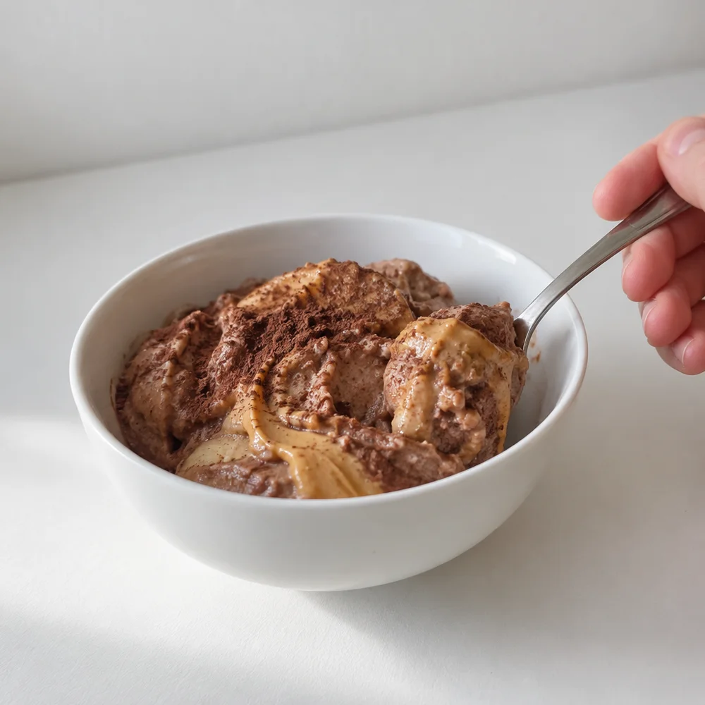Vegan chocolate banana nice cream with peanut butter