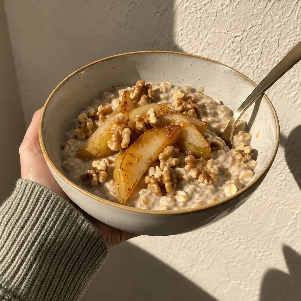 Vegan porridge with caramelised pear and walnuts